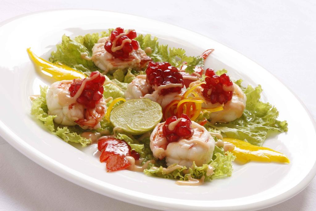 Heritage Мадурай Экстерьер фото A salad of scallops