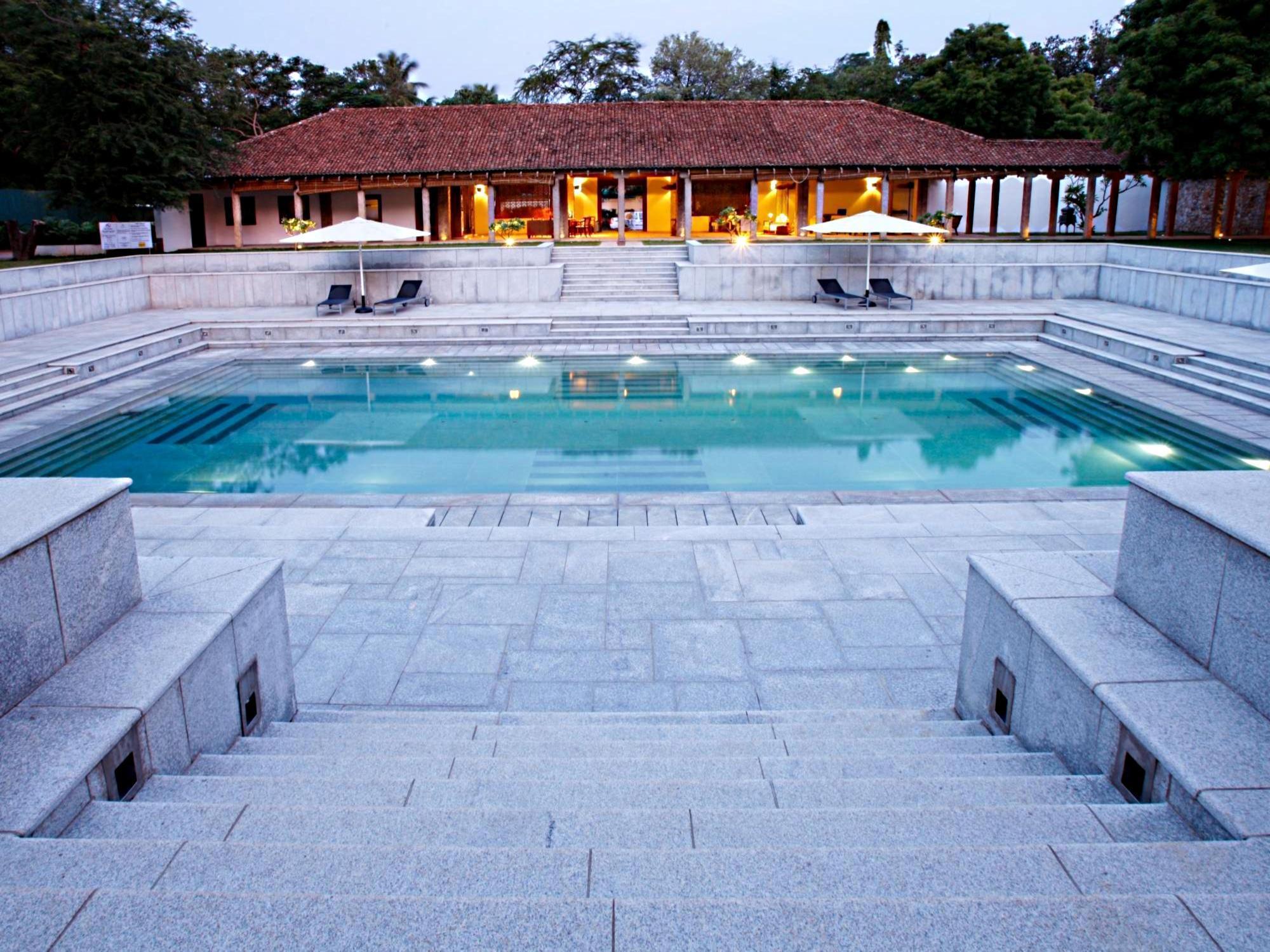 Heritage Мадурай Экстерьер фото The swimming pool at the resort